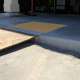 Installing an ADA ramp for public access.