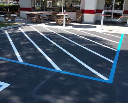 Restriping parking lot at bay area restaurant for ADA compliance.