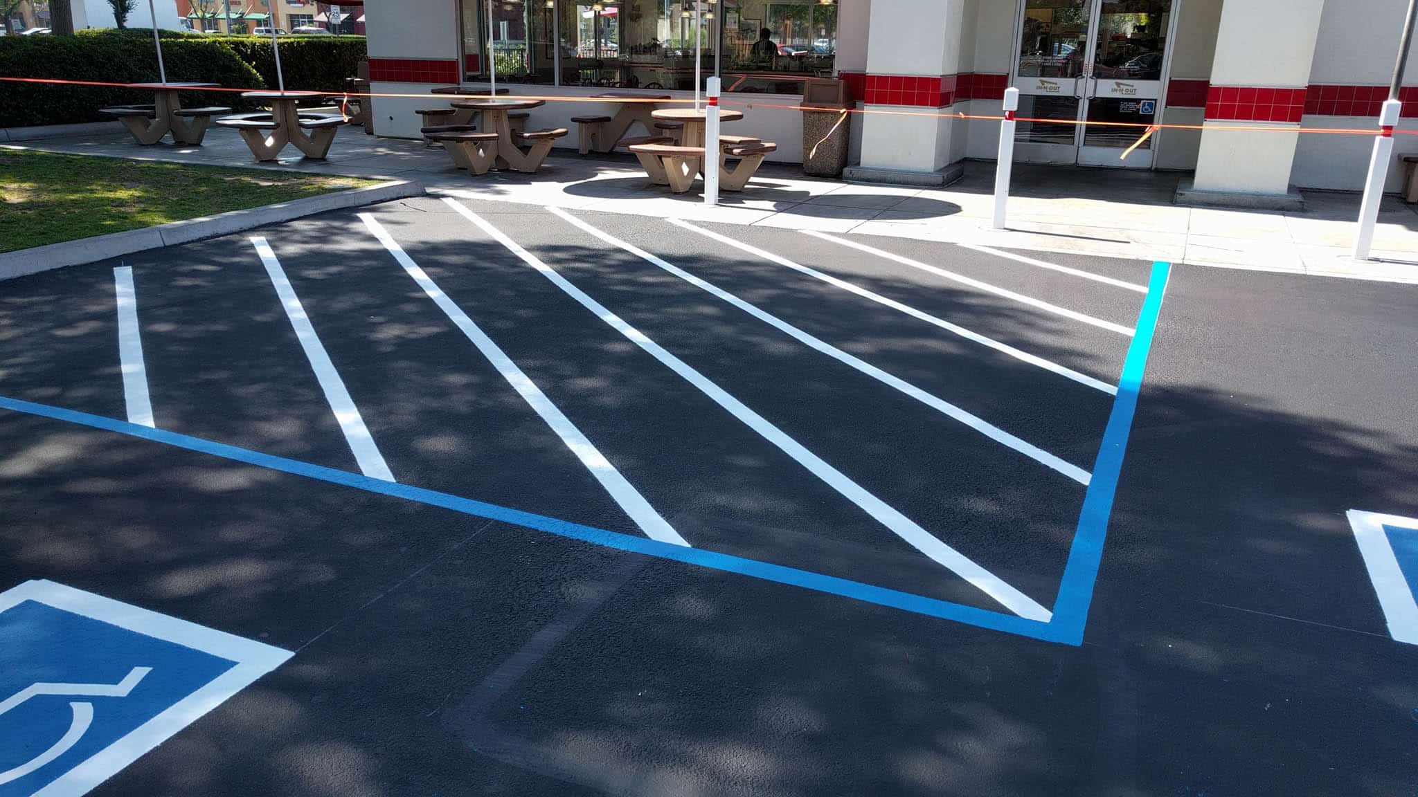 Restriping parking lot at bay area restaurant for ADA compliance.