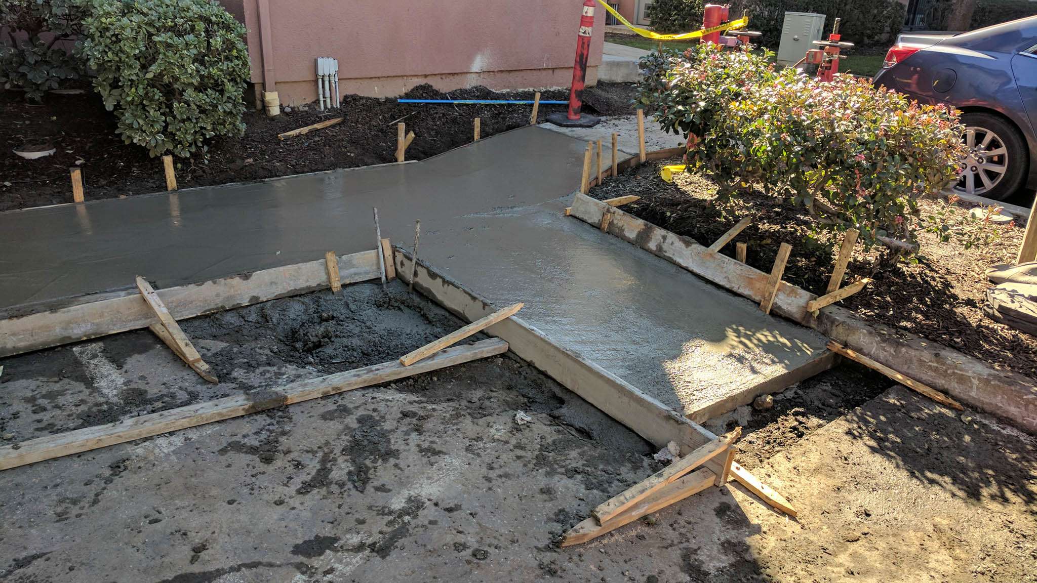 Concrete sidewalk project in progress.