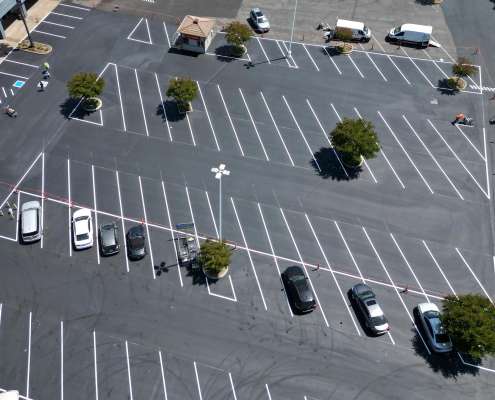 Aerial view of asphalt paving parking lot.