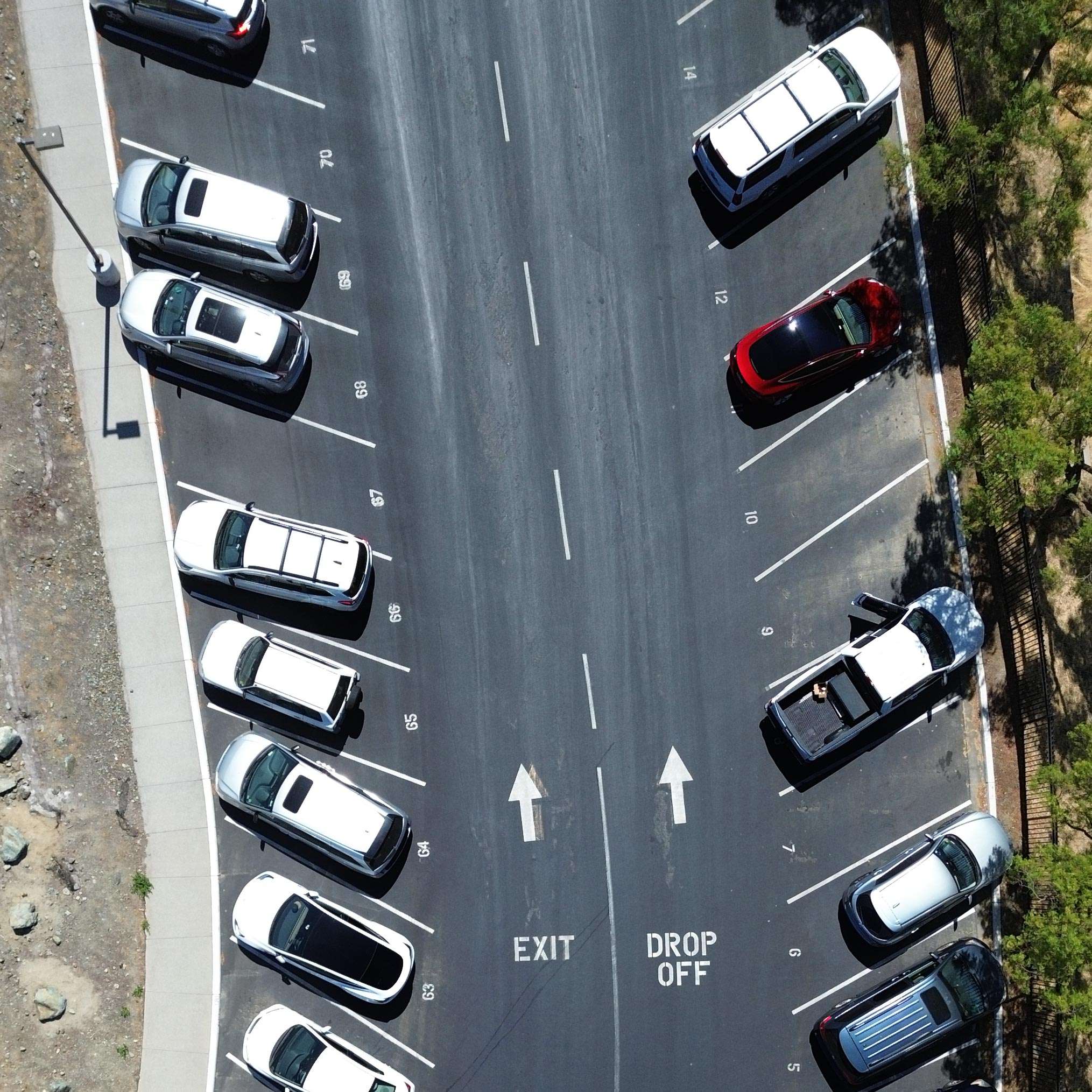 Aerial view of asphalt paving parking lot.
